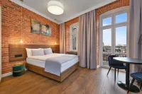 Aparthotel Krzywa Kamienica Отели в г. 