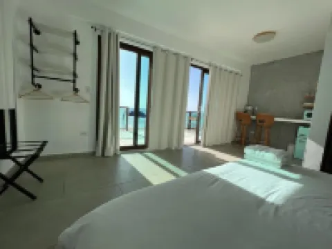 Corcega Beachfront Suites Hotels in Calvache