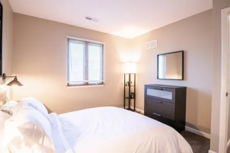 Dramatic Monochromatic Design with Modern Amenities - Cozy Chic