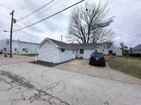 Cozy Living Area and Modern Kitchen Amenities - Charming Retreat