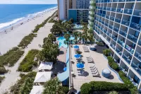 Heated pools and direct oceanfront at Coral Beach