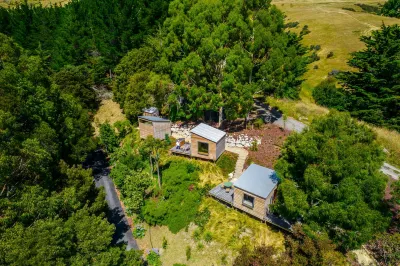 Russell's Cabins Отели в г. Уэйпара