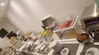 Executive Inn Boutique Hotel - petit déjeuner