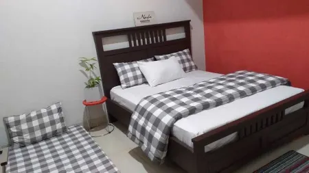 Jingga Guesthouse Отели в г. Букиттинги