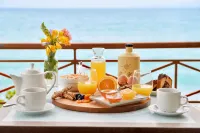 Pharos Rooms - servizio colazione