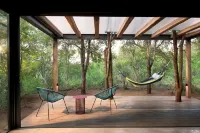 Mbazo Safaris Hotels near Black Rhino Game Reserve