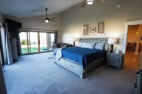 Spacious 8-bedroom house with a private heated pool, spa, pickleball and more!