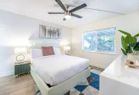 Coastal Escape • Walk to Beach • Gym •  Pool • Hot Tub