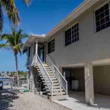 It’s all here for you. Lagoon, pool, sun deck, kayaks, sunsets. Hotel Exterior