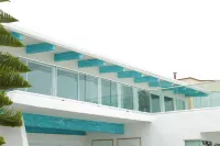 Large beachfront loft apartment in gated community Playa La Misión with deck.