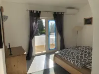 Modern, quietly located vacation apartment with sea view + close to the beach, fully air-conditioned