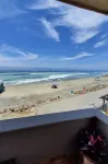 Relaxed Spanish beachfront condo w/private parking & private balcony ocean views