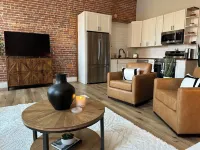 Stylish & Modern 2-Bdrm Apt in Downtown Warsaw featuring an urban rooftop deck.
