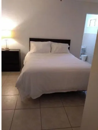 The beach is our back yard apt #1A