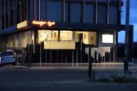 ROOTS A Unit of Coastal Dine Restaurant & Lodging Hotel a 