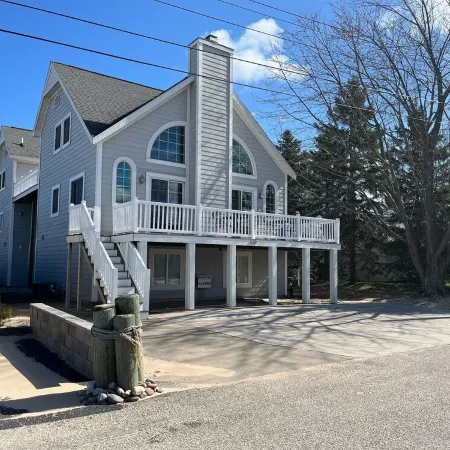 Sleeps 24+! Large home steps from Lake Michigan with views of the Lighthouse