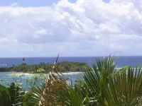 Air-conditioned waterfront studio with terrace and sea view.