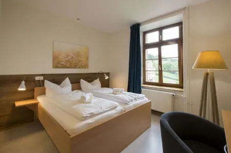 Hôtellerie du Couvent Oberbronn Отели в г. Виндштейн