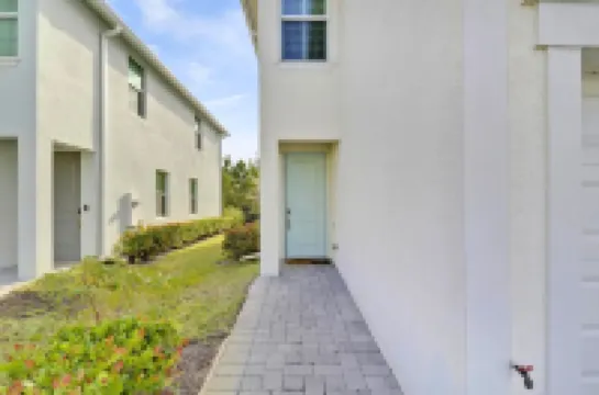 Down the road from the beach! Coastal home w/ full kitchen, 3BR, patio & grill.