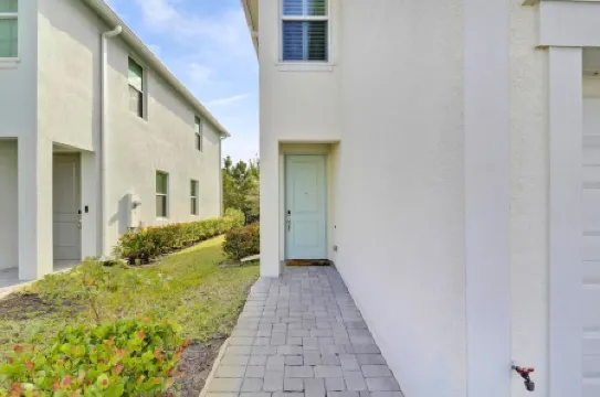 Down the road from the beach! Coastal home w/ full kitchen, 3BR, patio & grill.