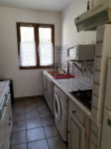 In a forest, in a haven of greenery with private swimming pool.