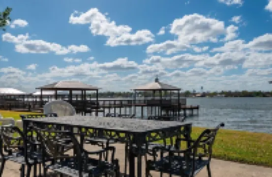 Screened porch and private pier on False River