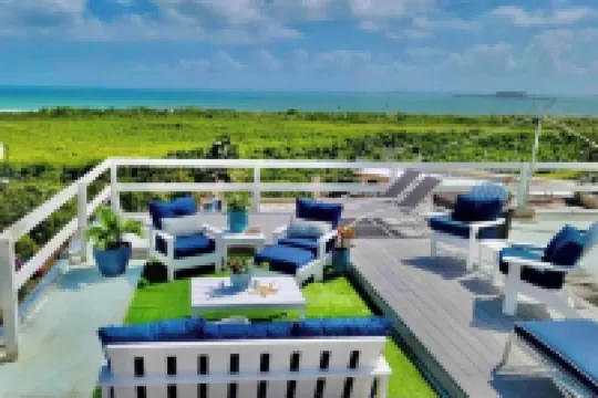 "Comfortable, modernized 5BR 4BA Home with an amazing Ocean View and breeze!