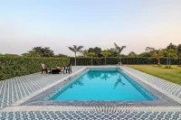 ELIVAAS Amaltas 4BHK Hideaway With Pool