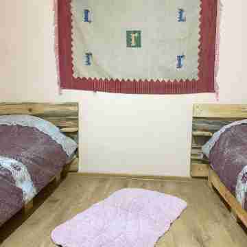 The apartment is in a cozy and quiet environment Rooms