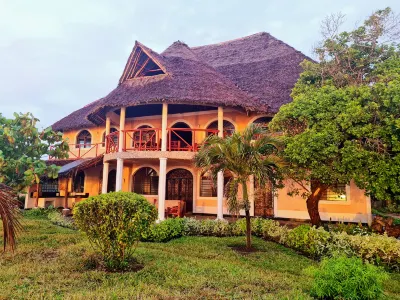 Room in Guest Room - Colobus Suite of 40m2 in Villa 560 m2, View of the Indian Ocean Hotels in 