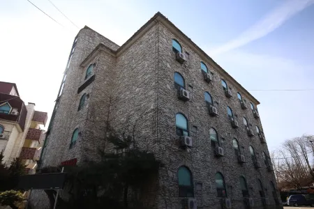 Dangjin Kkumui Gungjeon Отели в г. Танджин