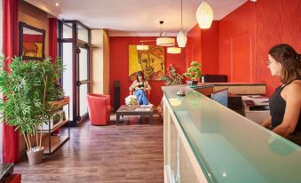 5. Hôtel Mo..