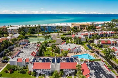 Watch dolphins & pelicans from this 2 bedroom/2 bath waterfront condo.