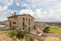 A fantastic pool in a Tuscan farmhouse with breathtaking views of the Maremma