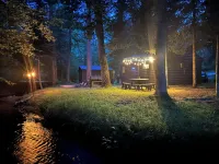 Cozy cabin with backyard stream close to Au Sable River and the best ATV trails Hotels in Oscoda County