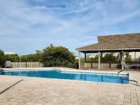 Relax, unwind and have a great time at Two Beaches. - Pool