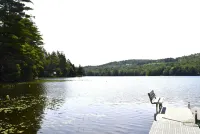 Peaceful lakeside getaway. Enjoy morning coffee listening to the loons.