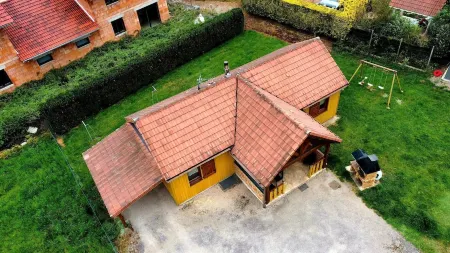 Rental of fenced chalet with barbecue and children's play area