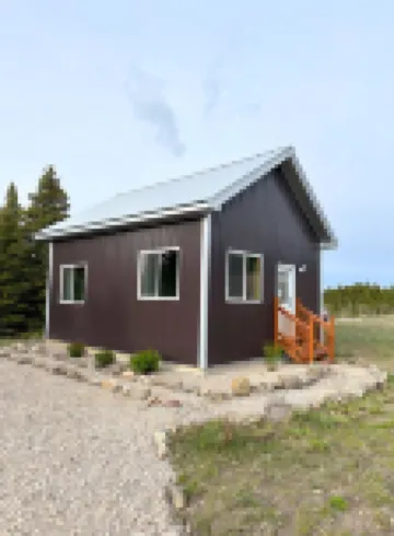 Cozy Cabin w/ Waterfall near Glacier National Park