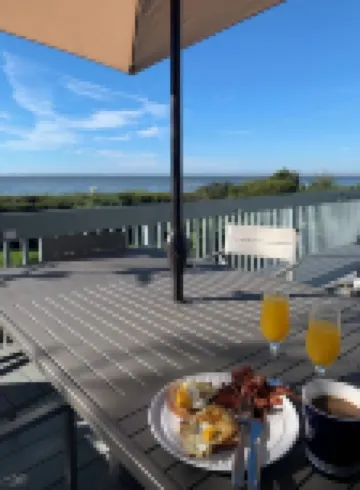 Oceanfront, vintage beach house steps from the sand on Seabrook Island.