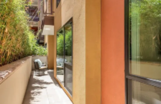 Pets Stay Free • Private Terrace • Elevator • King Beds • In-Unit W/D