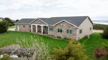 Location Location Location!  on a River View Acreage, Sleeps up to 14, Pets  ok.