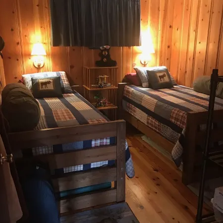 Quaint two bedroom cabin just a few steps away from and on Mountain Rest Lake.