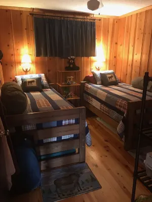 Quaint two bedroom cabin just a few steps away from and on Mountain Rest Lake.