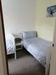 Honeysuckle Cottage with optional hot tub and shared EV charger.