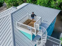 Escape to CASA PALMA HIDEAWAY! 4BD/3BA, Pool, Outdoor Kitchen, boat slip & More! Hotels near The Island Club at North Captiva