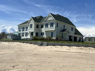 Huge Cape Cod Style Home on all Sandy beach / Cedar Lake MI