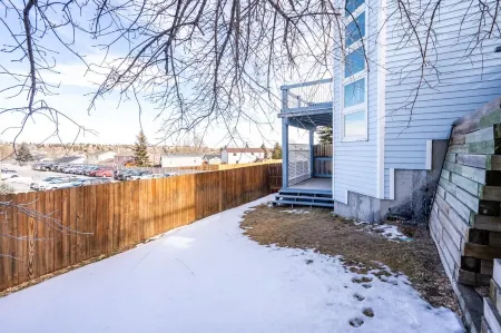Unique Triangle Shaped Home with 2 Master Suites on Separate Floors.