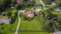 A Large Tropical 7 Bedroom Estate by Redawning
