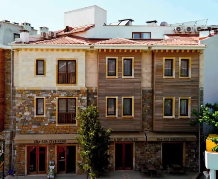 TROIADA Hotel Отели в г. Гёкчеада